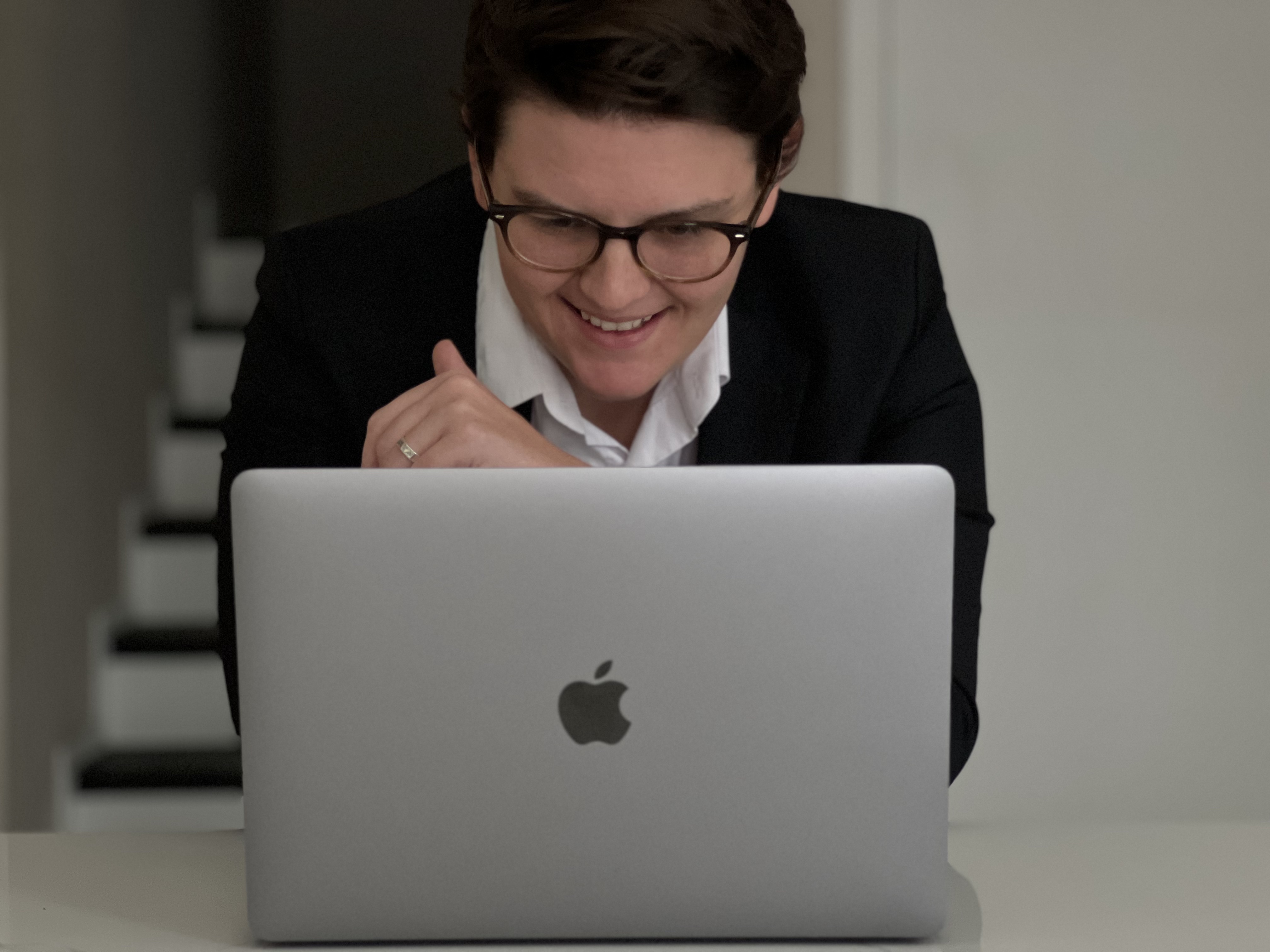 Maddie working at her laptop